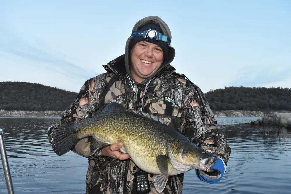 Only a small cod, but this pic shows a good example of layering and protecting heat loss from your head with a thermal beanie and a hooded mid-layer.