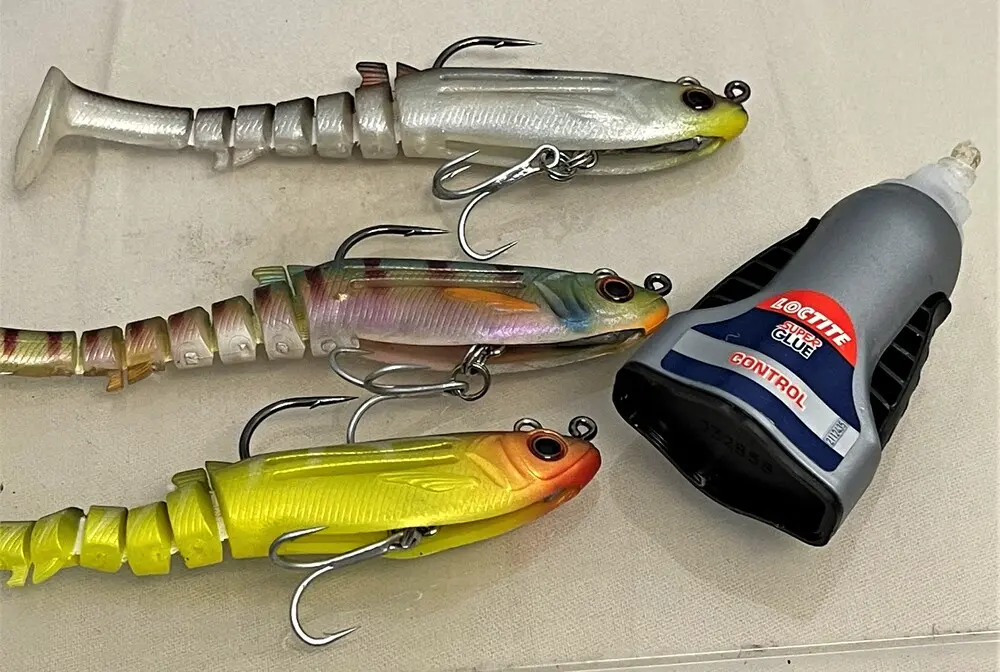 Step 4 - Add the trebles and pop the tiniest dot of glue on the jighead lead just behind the lure's eye to secure everything.
